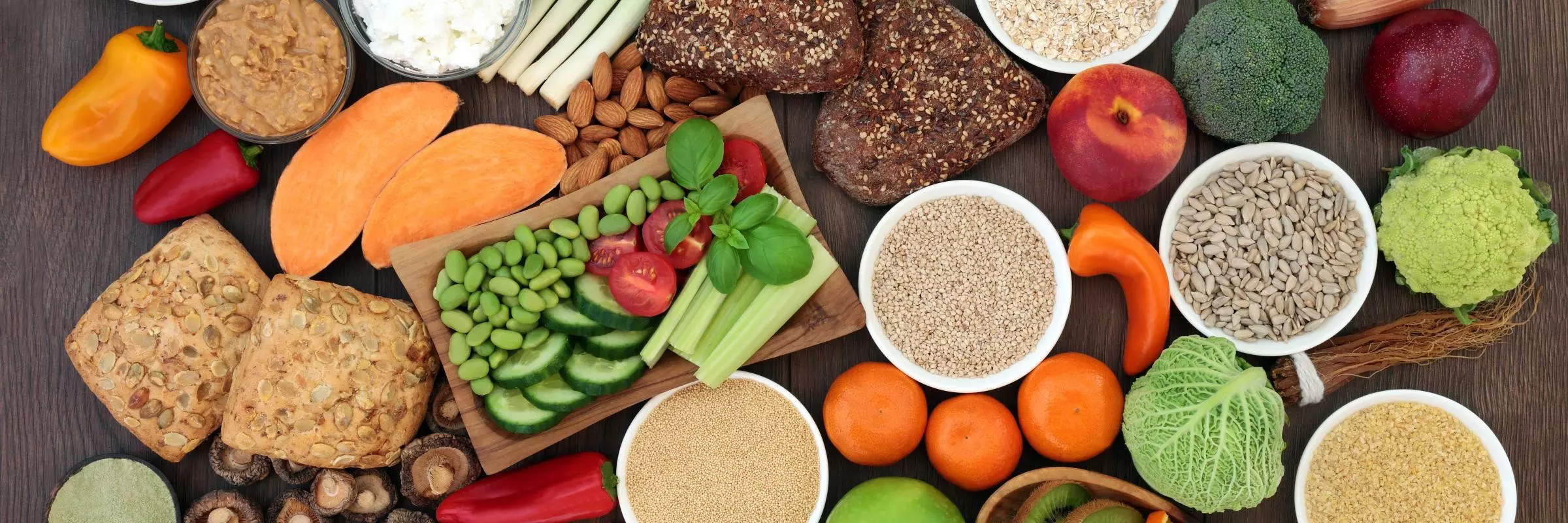 A variety of grains, fruits and vegetables are visible
